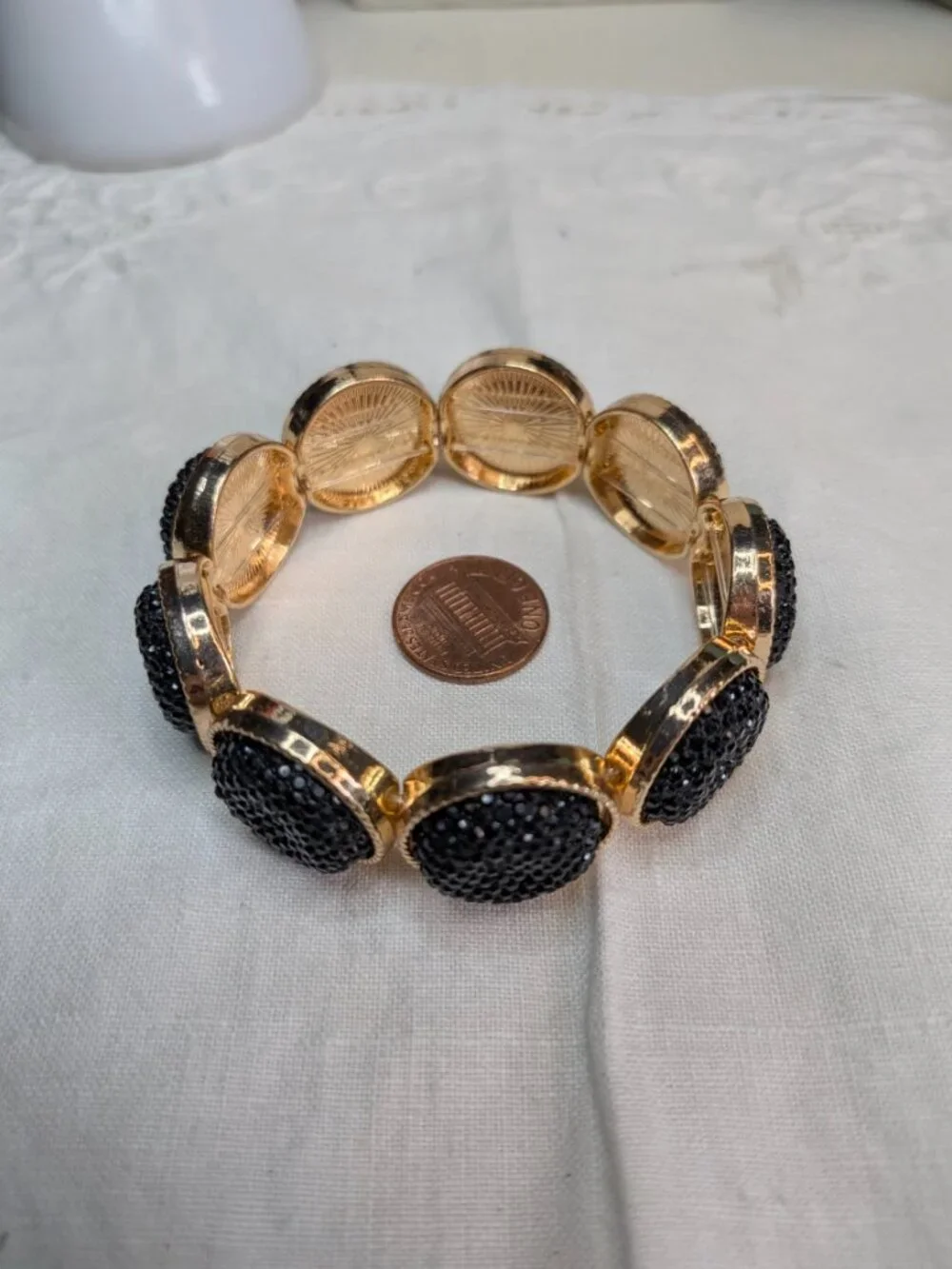 Gold Tone Stretch Bracelet with Black Faux Druzy Accents